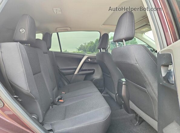 2T3WFREV7JW425424 2018 TOYOTA RAV4 Purple Widok wnętrza z tyłu