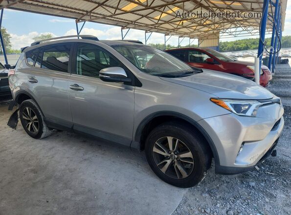 2T3WFREV7JW476020 2018 TOYOTA RAV4 Gray Przód prawy