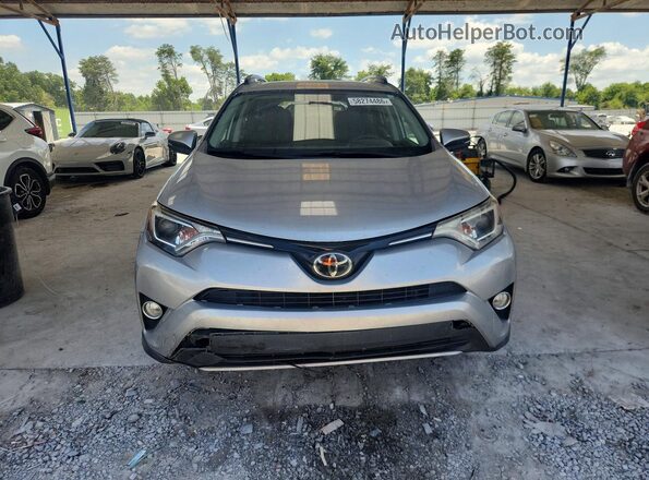 2T3WFREV7JW476020 2018 TOYOTA RAV4 Gray Widok z przodu