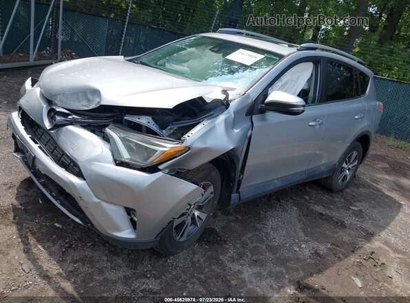 2T3WFREV7JW496123 2018 TOYOTA RAV4 Silver Передня ліва чверть