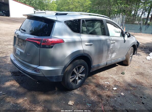 2T3WFREV7JW496123 2018 TOYOTA RAV4 Silver Задня права чверть