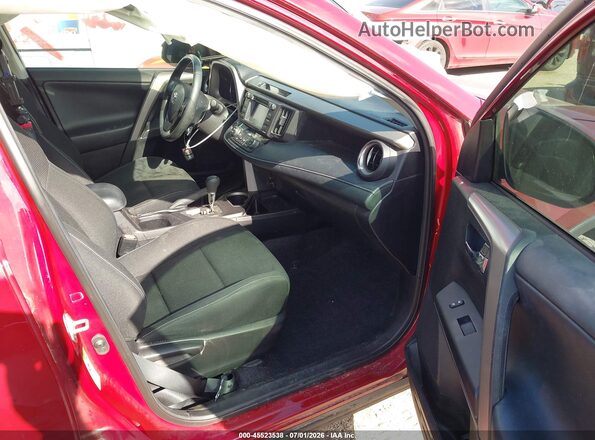 2T3WFREV7JW503880 2018 TOYOTA RAV4 Red Widok wnętrza z przodu