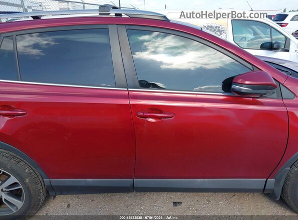 2T3WFREV7JW503880 2018 TOYOTA RAV4 Red Widok wnętrza z tyłu