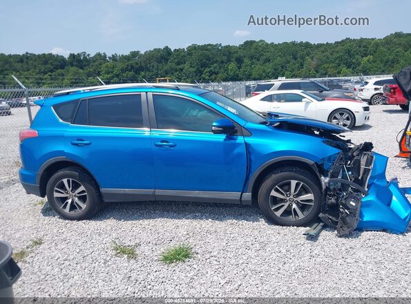 2T3WFREV8HW396414 2017 TOYOTA RAV4 Blue Vista interior trasera