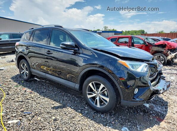 2T3WFREV8JW434312 2018 TOYOTA RAV4 Black Front right