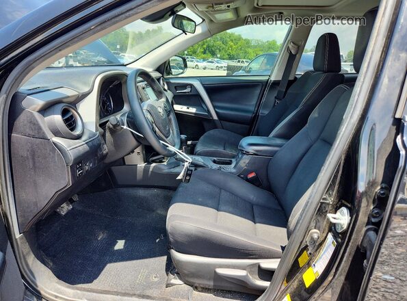 2T3WFREV8JW434312 2018 TOYOTA RAV4 Black Front interior view