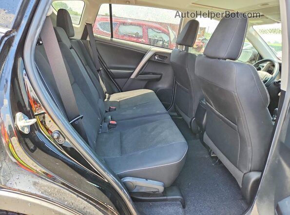 2T3WFREV8JW434312 2018 TOYOTA RAV4 Black Rear interior view