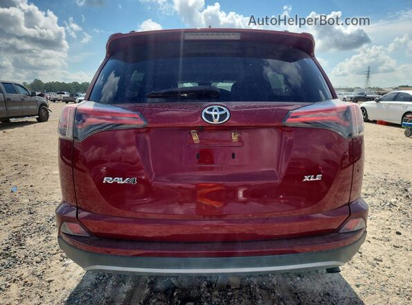 2T3WFREV8JW491190 2018 TOYOTA RAV4 Burgundy Rear view