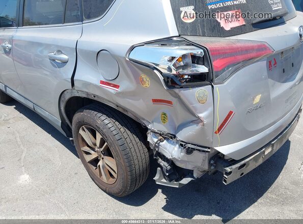 2T3WFREV9GW251073 2016 TOYOTA RAV4 Silver Vista frontal