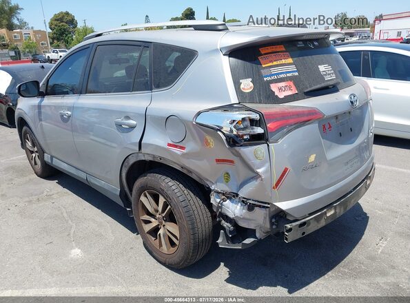 2T3WFREV9GW251073 2016 TOYOTA RAV4 Silver Trasero izquierdo