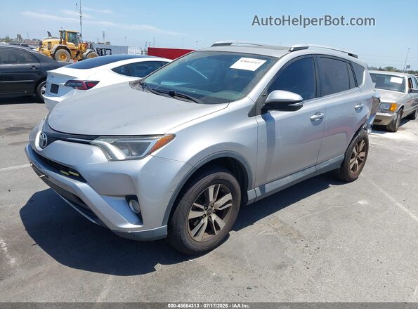 2T3WFREV9GW251073 2016 TOYOTA RAV4 Silver Vista tres cuartos delantera izquierda