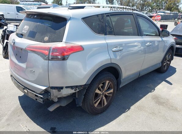 2T3WFREV9GW251073 2016 TOYOTA RAV4 Silver Trasero derecho