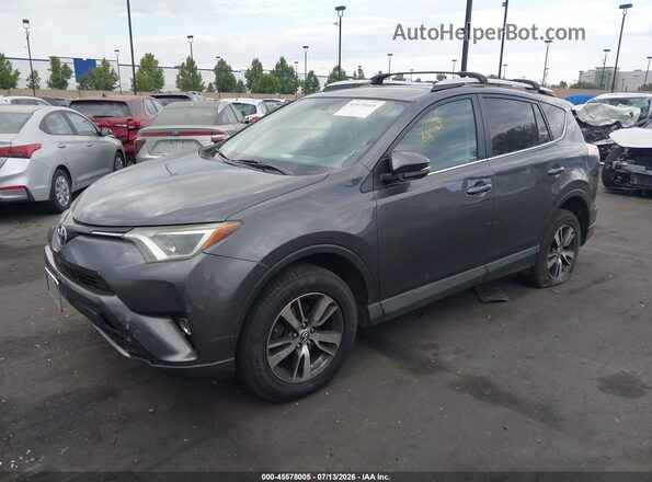 2T3WFREV9GW256791 2016 TOYOTA RAV4 Gray Przód lewy