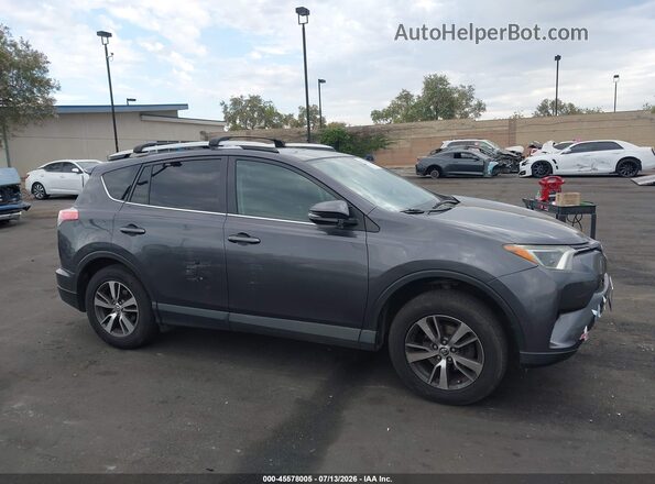 2T3WFREV9GW256791 2016 TOYOTA RAV4 Gray Widok wnętrza z tyłu