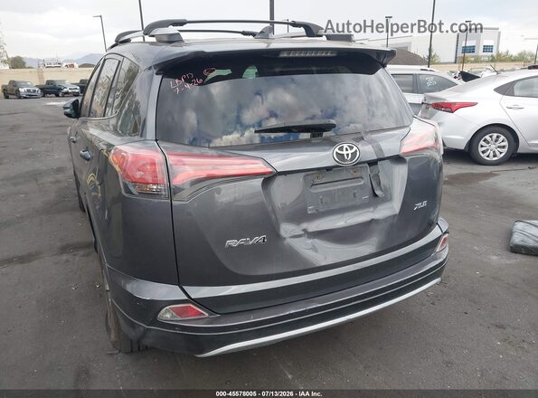2T3WFREV9GW256791 2016 TOYOTA RAV4 Gray 