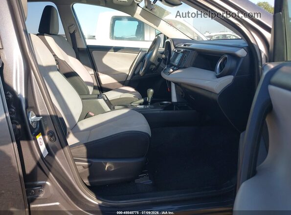 2T3WFREV9HW340644 2017 TOYOTA RAV4 Gray წინა სალონის ხედი