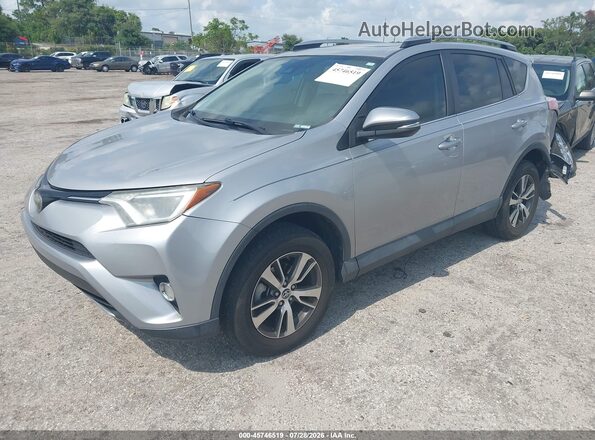 2T3WFREV9JW419589 2018 TOYOTA RAV4 Silver Przód lewy