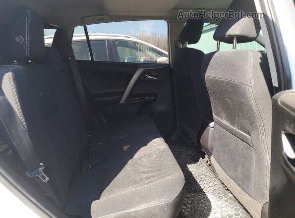 2T3WFREV9JW494227 2018 TOYOTA RAV4 White Vista de los asientos traseros