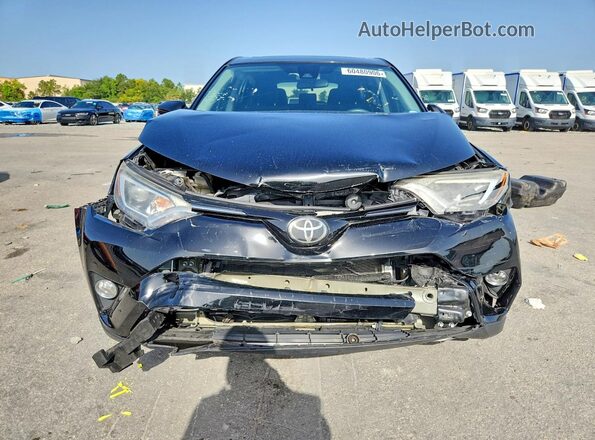 2T3WFREV9JW518204 2018 TOYOTA RAV4 Black Вид спереду