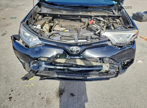 2T3WFREV9JW518204 2018 TOYOTA RAV4 Black Вид підкапотного простору