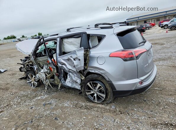 2T3WFREVXHW344878 2017 TOYOTA RAV4 Silver უკანა მარცხენა