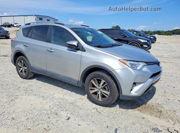 2T3WFREVXHW383860 2017 TOYOTA RAV4 Серебряный Передняя правая четверть