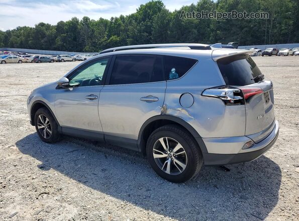 2T3WFREVXHW383860 2017 TOYOTA RAV4 Серебряный Задняя левая четверть