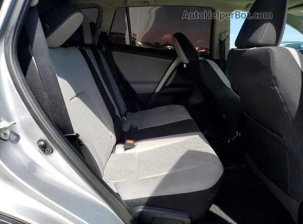 2T3WFREVXHW383860 2017 TOYOTA RAV4 Серебряный Вид задней части салона