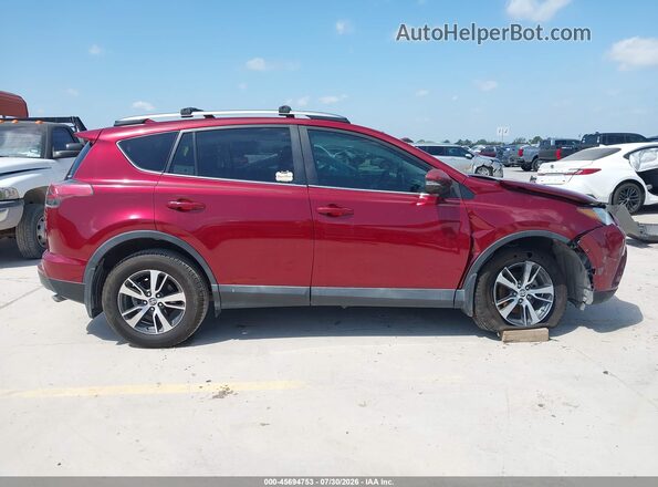 2T3WFREVXJW461138 2018 TOYOTA RAV4 Red Вид задньої частини салону