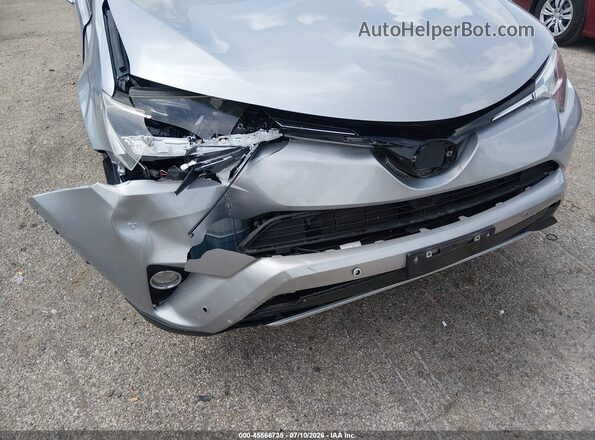 2T3YFREV0GW268594 2016 TOYOTA RAV4 Silver Вид спереду