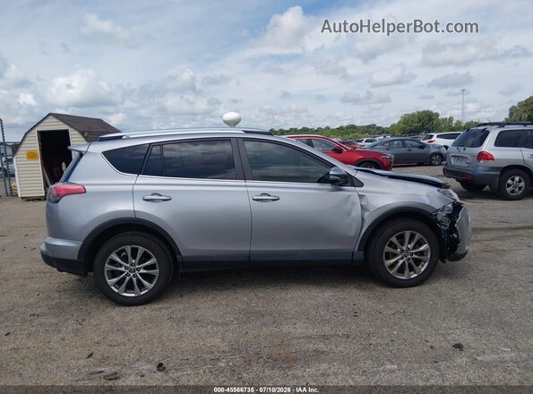 2T3YFREV0GW268594 2016 TOYOTA RAV4 Silver Вид задньої частини салону