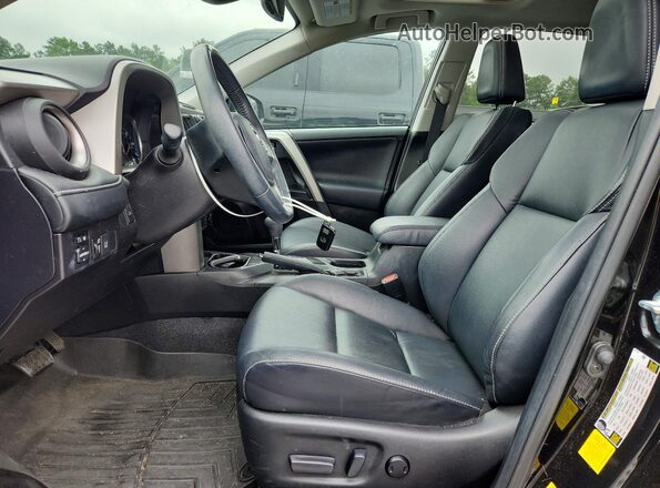 2T3YFREV0GW279966 2016 TOYOTA RAV4 Black წინა სალონის ხედი