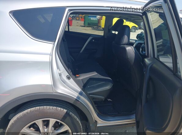 2T3YFREV0HW323157 2017 TOYOTA RAV4 Silver Вид наклейки з VIN-кодом