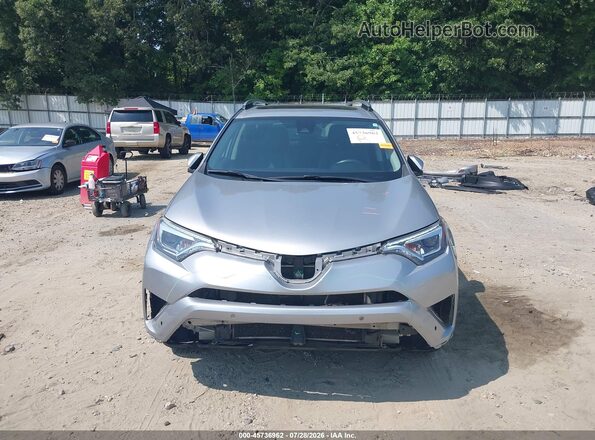 2T3YFREV0HW323157 2017 TOYOTA RAV4 Silver Вид задньої частини салону