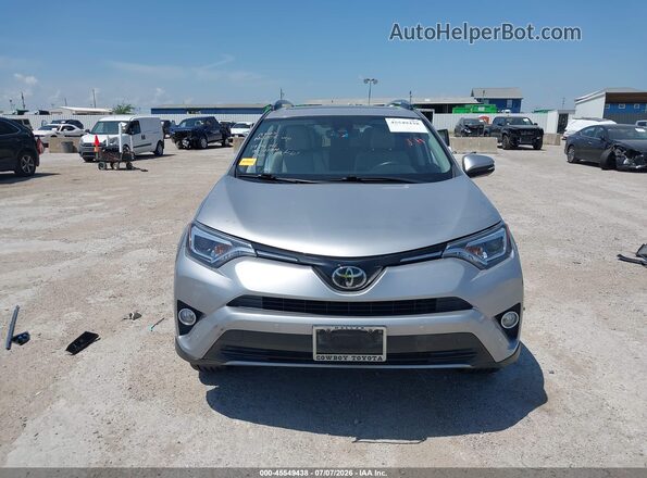 2T3YFREV0HW378711 2017 TOYOTA RAV4 Silver Вид задньої частини салону
