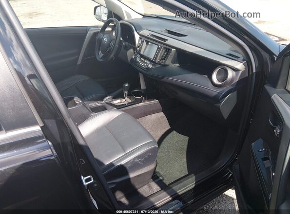 2T3YFREV0HW386243 2017 TOYOTA RAV4 Black წინა სალონის ხედი
