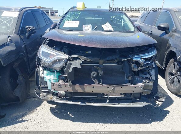 2T3YFREV0JW518990 2018 TOYOTA RAV4 Purple Widok wnętrza z tyłu