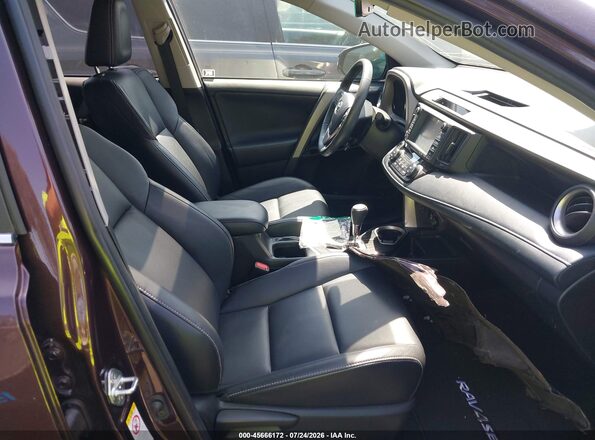 2T3YFREV0JW518990 2018 TOYOTA RAV4 Purple Widok wnętrza z przodu