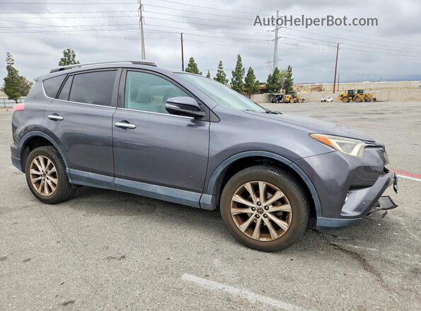 2T3YFREV4JW490711 2018 TOYOTA RAV4 Gray Delantero derecho