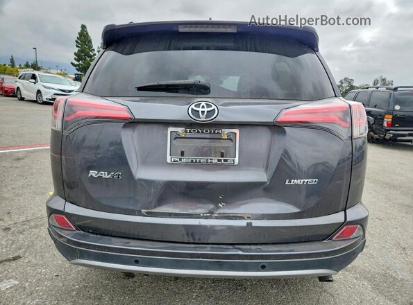 2T3YFREV4JW490711 2018 TOYOTA RAV4 Gray Vista trasera
