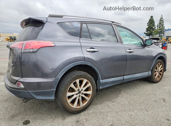 2T3YFREV4JW490711 2018 TOYOTA RAV4 Gray Trasero derecho