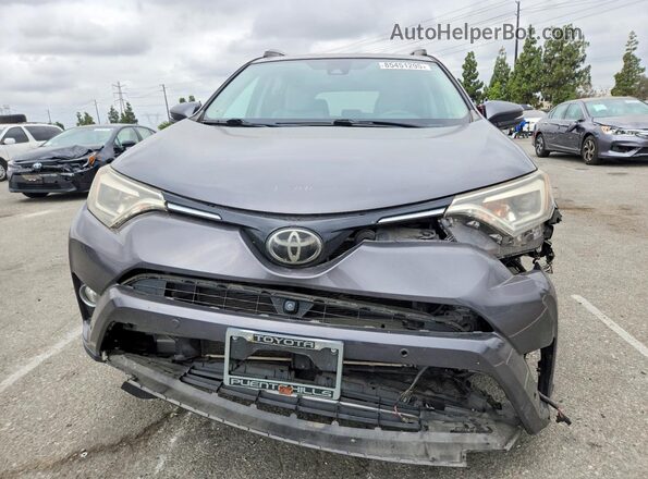 2T3YFREV4JW490711 2018 TOYOTA RAV4 Gray Vista frontal