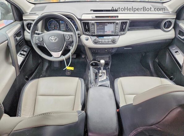 2T3YFREV4JW490711 2018 TOYOTA RAV4 Gray Vista del salpicadero