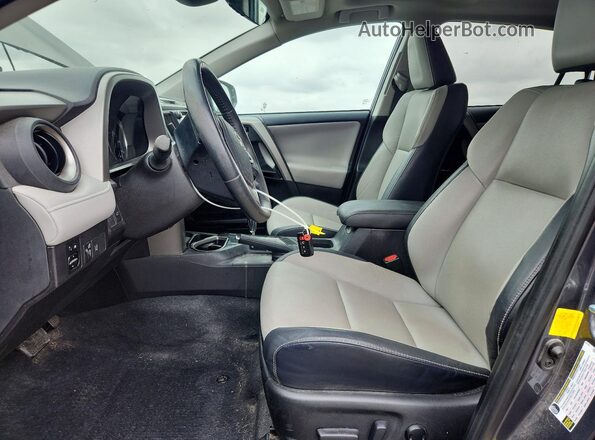 2T3YFREV4JW490711 2018 TOYOTA RAV4 Gray Vista interior delantera