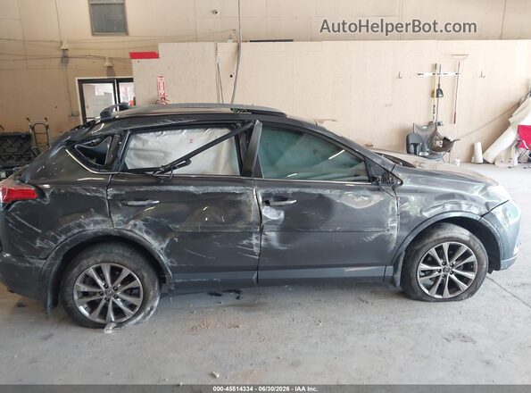 2T3YFREV6JW452252 2018 TOYOTA RAV4 Gray Widok wnętrza z tyłu