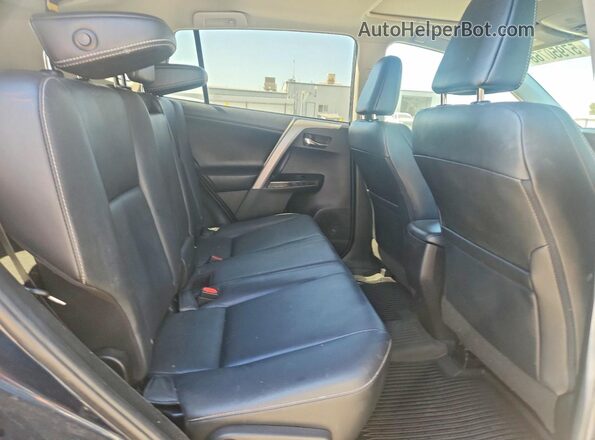 2T3YFREV9JW479171 2018 TOYOTA RAV4 Синий Вид задних сидений