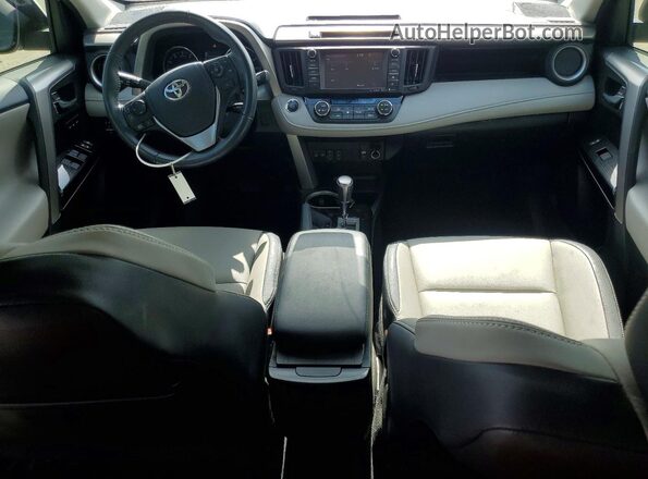 2T3YFREVXGW264102 2016 TOYOTA RAV4 White Widok deski rozdzielczej