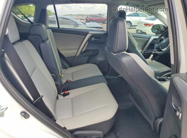 2T3YFREVXGW264102 2016 TOYOTA RAV4 White Widok wnętrza z tyłu