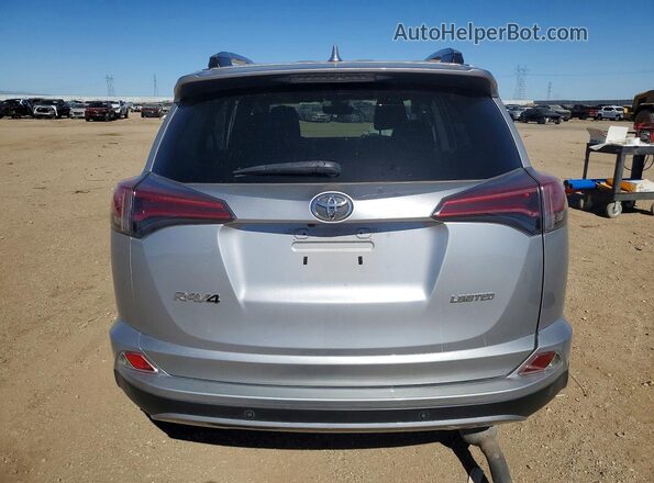2T3YFREVXHW331900 2017 TOYOTA RAV4 Silver უკანა ხედი