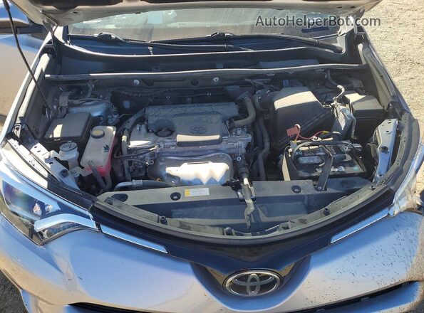 2T3YFREVXHW331900 2017 TOYOTA RAV4 Silver ძრავის განყოფილების ხედი